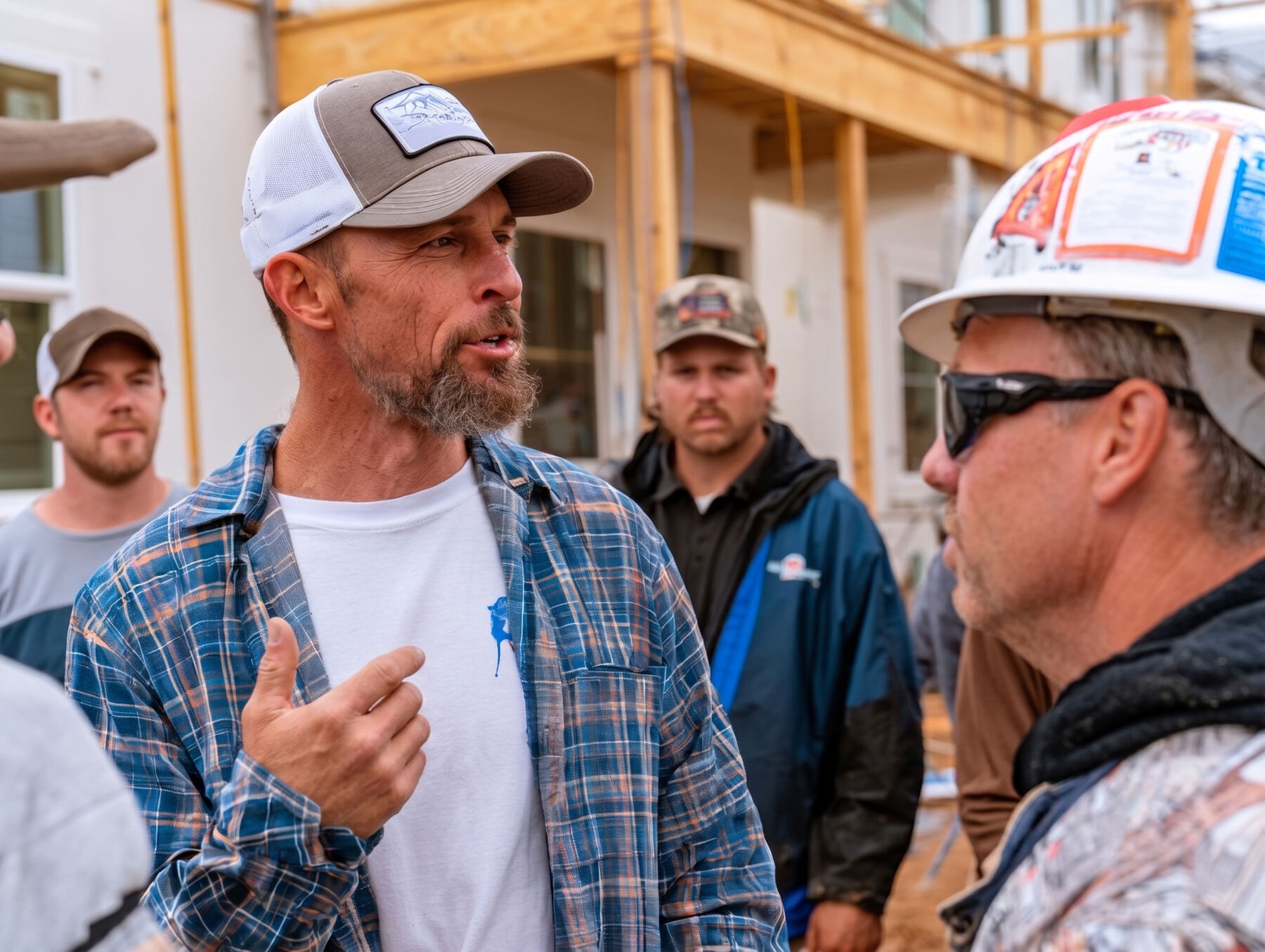 General contractor briefing his crew on a jobsite